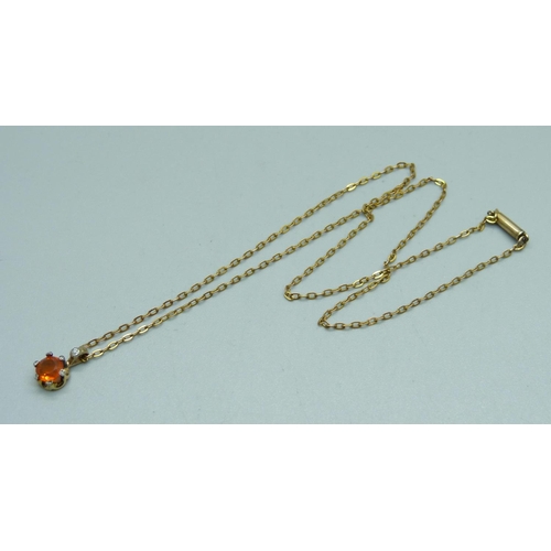 1058 - An antique fire opal pendant mounted in gold, claws tipped in silver and set with rose diamonds, (la... 