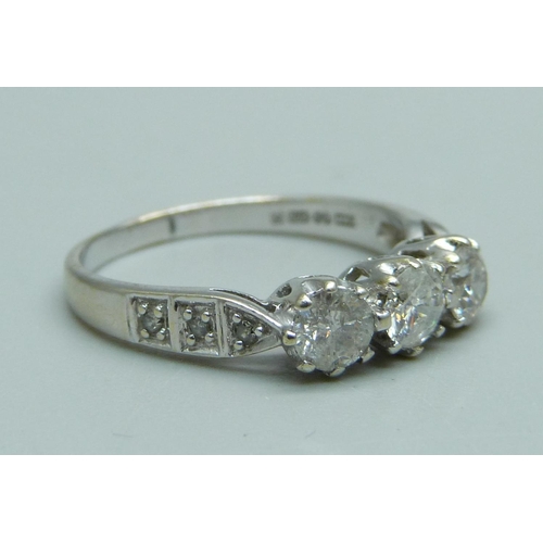 1063 - A 9ct white gold and diamond ring, 2.9g, P