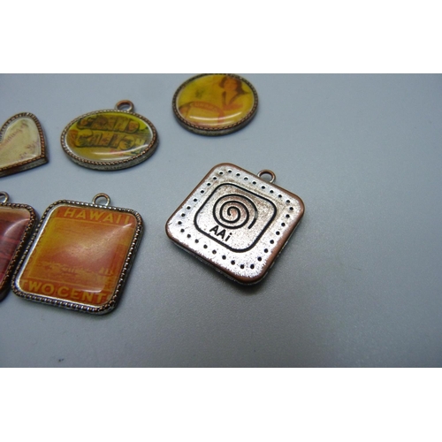 1079 - Eight souvenir pendants marked AAi