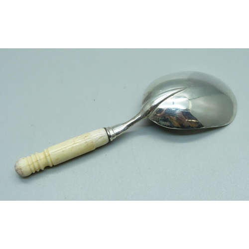 1113 - A William IV silver caddy spoon with bone handle, Birmingham 1830, makers Taylor & Perry