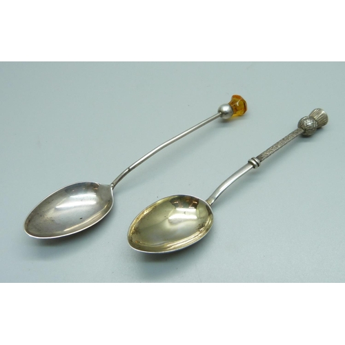 1116 - Two silver spoons with thistle finials, 16g