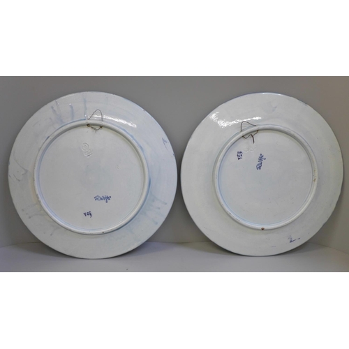 608 - A pair of Royal Blue Delft portrait plates, after Rembrandt, 32cm