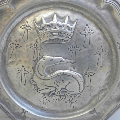 610 - Two French early pewter plates, contoured edges, decorated with crown over a porcupine and a crown o... 