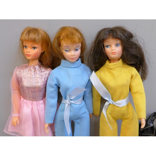 616 - Three 1970's dolls and clothes; two Uneeda Doll Co. and one other