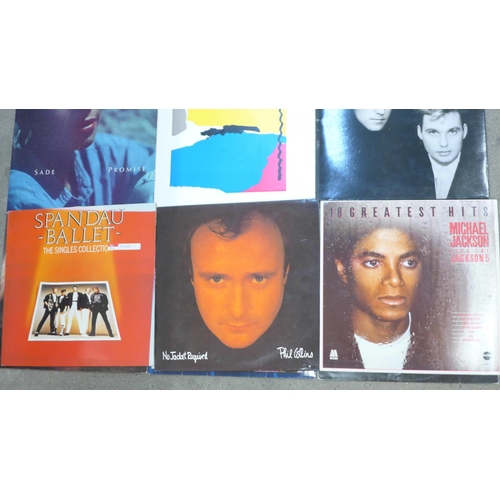 654 - Twelve 1980s LP records including The Jam, U2, Kate Bush, Sade, Roxy Music, etc.