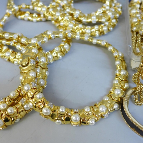 658 - Ten gold tone collars set with faux pearls and other gold tone jewellery including Cabouchon