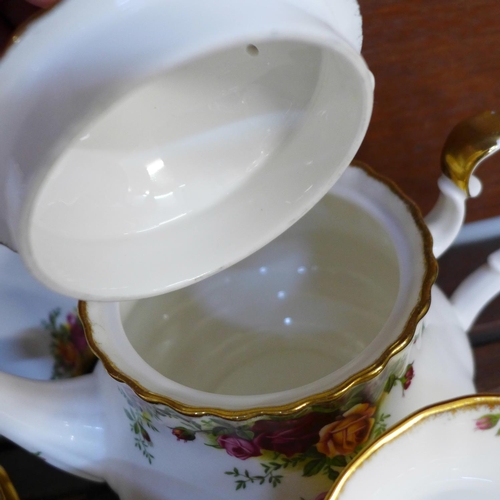 662 - A Royal Albert Old Country Roses six setting tea set with sandwich plate, cream, sugar and teapot, p... 