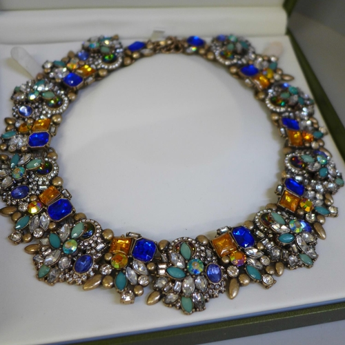 664 - A Napier necklace, Zara necklace and a case of costume jewellery