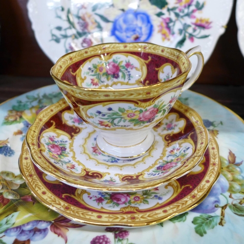 669 - A Royal Albert tea cup and saucer, second, a Royal Albert Lady Hamilton trio, a Lime House Studio cu... 