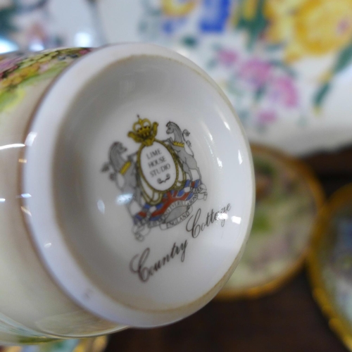 669 - A Royal Albert tea cup and saucer, second, a Royal Albert Lady Hamilton trio, a Lime House Studio cu... 