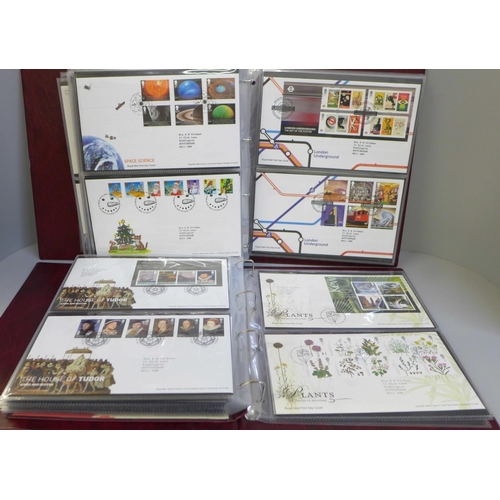 681 - Stamps:- two Royal Mail First Day Cover albums containing approximately 150 First Day Covers from th... 