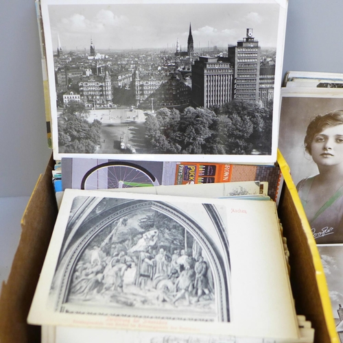 682 - A box of postcards, vintage to modern