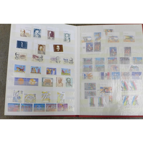 690 - Stamps:- stockbook of mint Greece stamps, vintage to modern