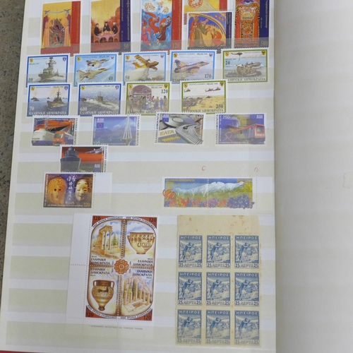 690 - Stamps:- stockbook of mint Greece stamps, vintage to modern