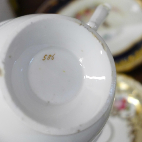 693 - A collection of Coalport porcelain including cups and saucers, slop bowl, plate, etc.