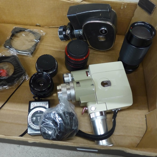 707 - A bag of mixed camera lenses and accessories and two cine cameras