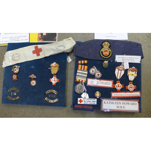 716 - Kathleen Howard, M.B.E., a collection of medals, medallions and awards including M.B.E., Red Cross P... 