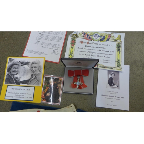 716 - Kathleen Howard, M.B.E., a collection of medals, medallions and awards including M.B.E., Red Cross P... 