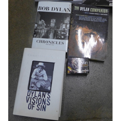 722 - A collection of Bob Dylan books, newspaper cuttings and calendar