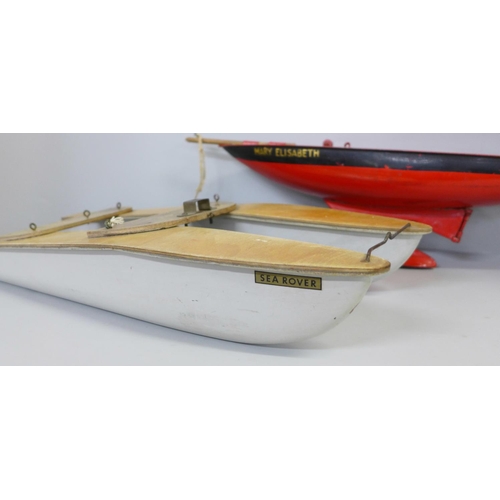 764 - A Tri-ang tin plate yacht hull and Sea Rover Catamaran hull