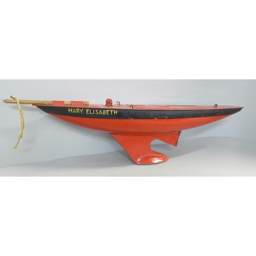 764 - A Tri-ang tin plate yacht hull and Sea Rover Catamaran hull