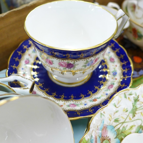 776 - A large collection of English porcelain cups and saucers including Minton, Davenport, Royal Doulton,... 