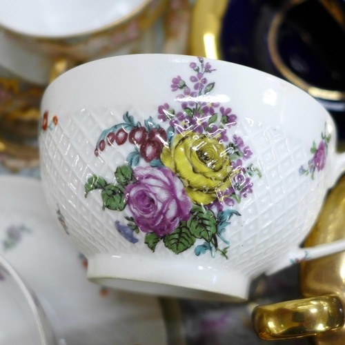 778 - A collection of continental French and German cups and saucers, one on a tray, a few in a set **PLEA... 