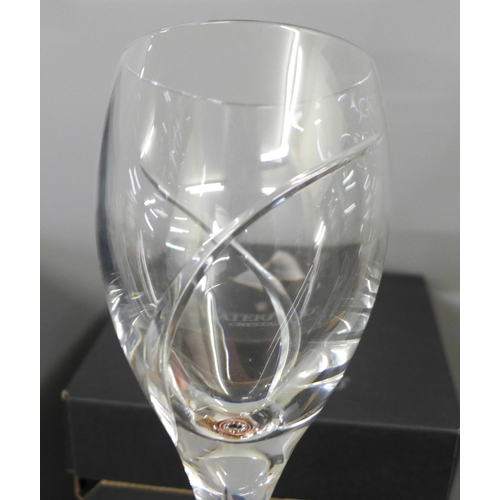 782 - A set of four Waterford Crystal wine glasses, boxed