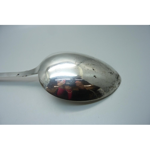 821 - A large Arts and Crafts Danish silver basting spoon, Christian F. Heise, 1904-1932, 147g, 36cm