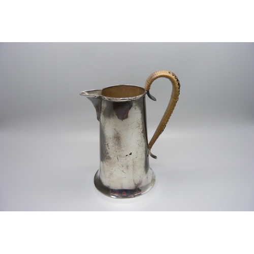 822 - A silver jug, worn Chester marks, 142g