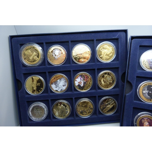 831 - A collection of gold and silver plated commemorative coins, 48 in total