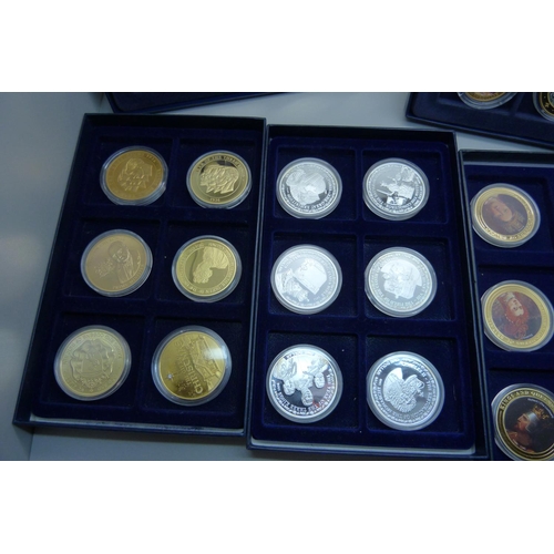 831 - A collection of gold and silver plated commemorative coins, 48 in total