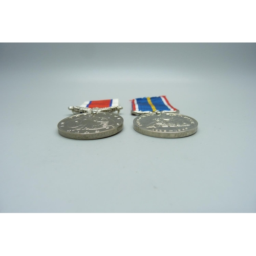 851 - A National Service medal and a Hors-de-Combat medal