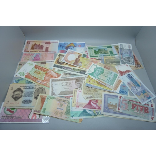 856 - Approximately 100 world bank notes including a novelty US note