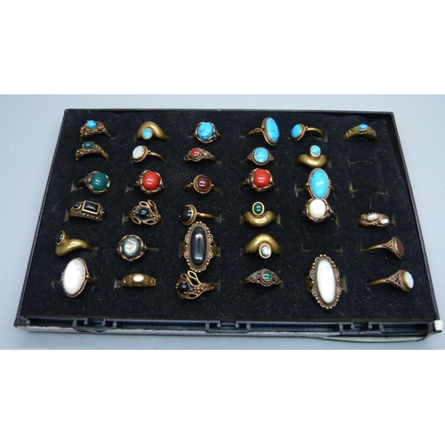 888 - A collection of stone set bronze rings