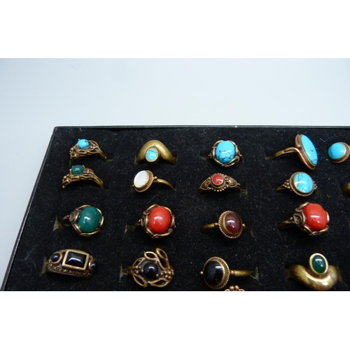 888 - A collection of stone set bronze rings