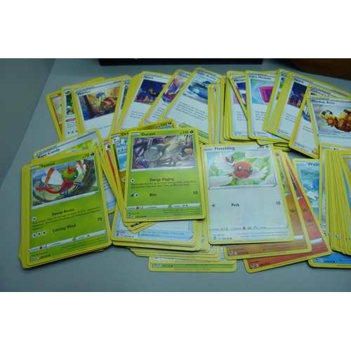 897 - 500 Pokemon cards, various sets in collectors box