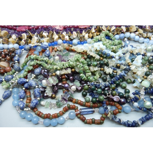 910 - Gemstone necklaces including tigers eye, amethyst, opalite, etc.