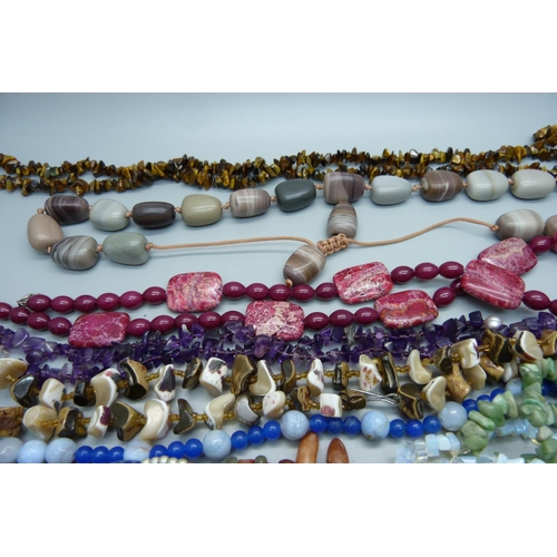 910 - Gemstone necklaces including tigers eye, amethyst, opalite, etc.