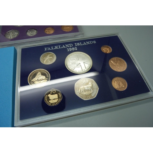 912 - A silver proof £1 coin, a 1977 Royal Australia mint proof coin set and a 1982 Falkland Islands Liber... 