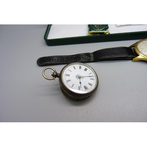 914 - A gentleman's Roamer wristwatch, a Bulova watch box and two silver pocket watches, a/f