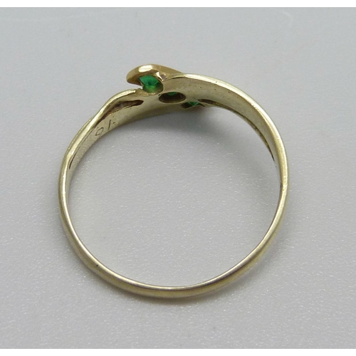 938 - A 585 14ct gold, emerald three stone ring, 1.8g, N