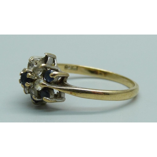 942 - A 9ct gold, blue and white stone cluster ring, 2.2g, Q, lacking one stone