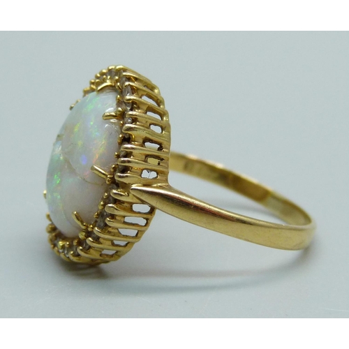 944 - An 18ct gold, opal and white stone set ring, extensive damage to stone, 4.1g, O