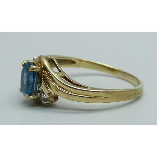 948 - A 14ct gold, blue stone and diamond five stone ring, 2.7g, S