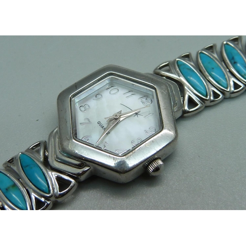 949 - A lady's silver wristwatch with turquoise set bracelet and mother of pearl dial