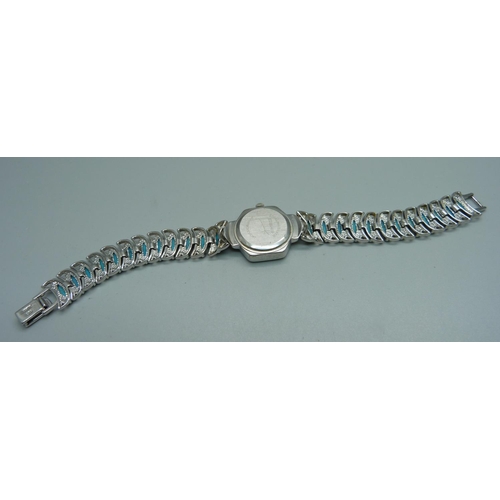 949 - A lady's silver wristwatch with turquoise set bracelet and mother of pearl dial