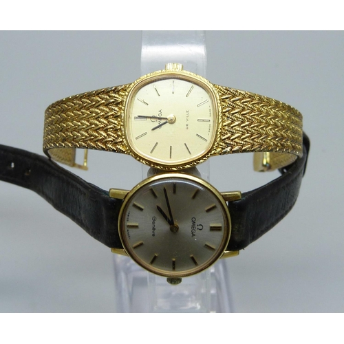 955 - Two lady's Omega wristwatches, one with bracelet stamped silver 925, the other with a leather strap ... 