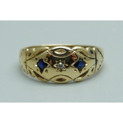 956 - A 9ct gold, sapphire and diamond ring, 2.1g, M