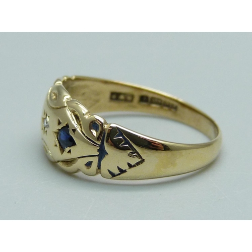 956 - A 9ct gold, sapphire and diamond ring, 2.1g, M